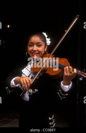 1, one, Mexican woman, Mexican, woman, violinist, playing violin, violin, violin player, musician, mariachi band, Tlaquepaque, Jalisco State, Mexico Stock Photo