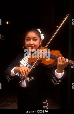 1, one, Mexican woman, Mexican, woman, violinist, playing violin, violin, violin player, musician, mariachi band, Tlaquepaque, Jalisco State, Mexico Stock Photo