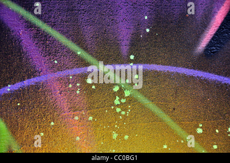 Paint splatter and colored lines on rough surface. Abstract artistic background. Stock Photo