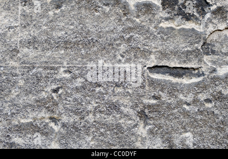Crack in a stone wall Stock Photo