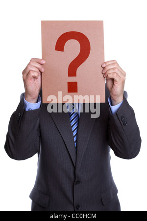 Man covering his face with a question mark sign Stock Photo