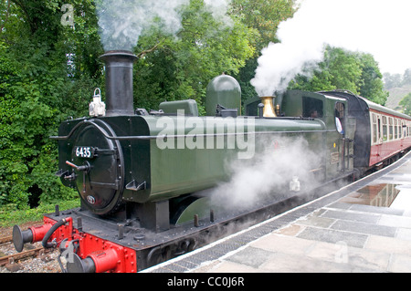 GWR 64xx Class 0-6-0PT Steam locomotive prepares to move out of Bodmin Parkway station. Stock Photo