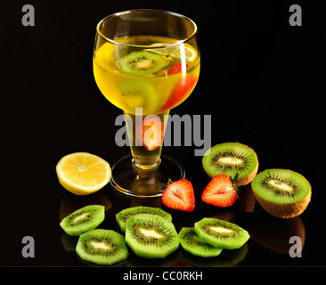 fruit jello in a glass and fresh fruits Stock Photo