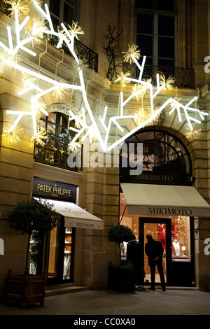 Patek Philippe and Mikimoto Shops in Place Vendome Square at Christmas in Paris, France Stock Photo