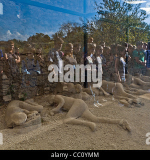 Students at  the “Garden of Fugitives, petrified corpses in Pompeii, Campania, Italy Stock Photo