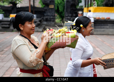 Religious ceremony at a temple in front of the bat cave, Goa Lawah, Bali, Indonesia, Stock Photo