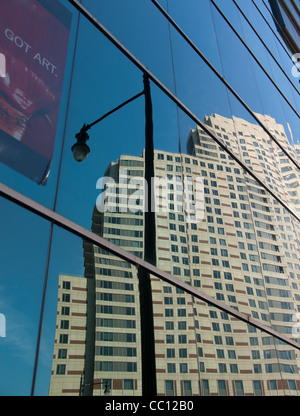 Reflections into a Grand Rapids, Michigan, USA windows of another ...