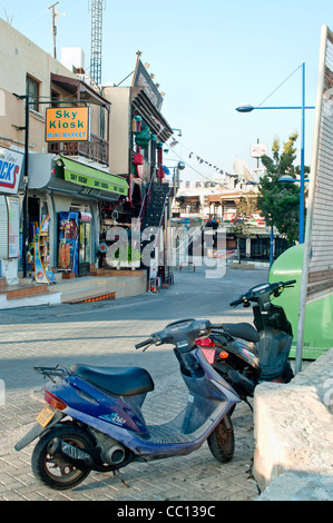 Scooter parking on street of Aya-Napa. Cyprus. Stock Photo