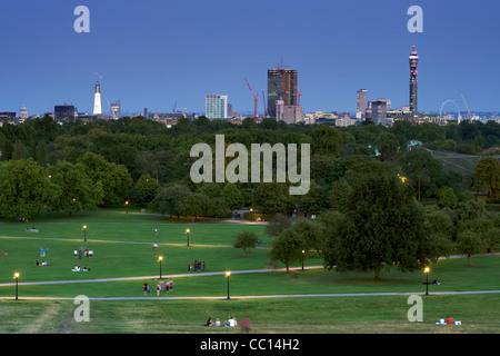 A dusk view of the London skyline from Primrose Hill showing the BT tower and the London Eye. Stock Photo