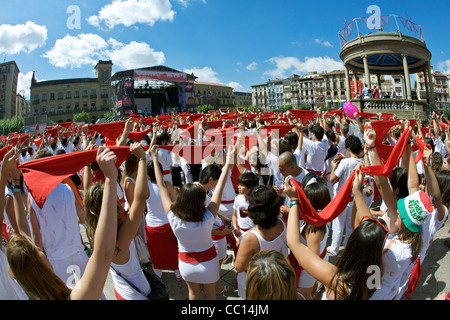 Jubilant crowds at the opening ceremony of the annual festival of San Fermin (aka the running of the bulls) in Pamplona, Spain. Stock Photo