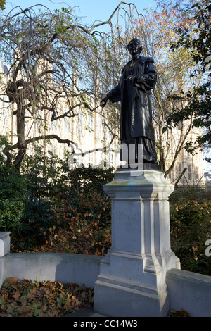 emmeline pankhurst memorial in victoria tower gardens at the palace of westminster houses of parliament buildings London England Stock Photo