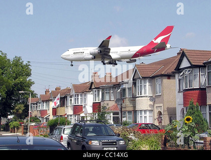 A Qantas Boeing 747-400 (registration unknown) approaching runway 27L at London Heathrow Airport Stock Photo