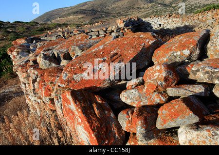 greece cyclades islands sikinos a dry stone wall with lichen Stock Photo