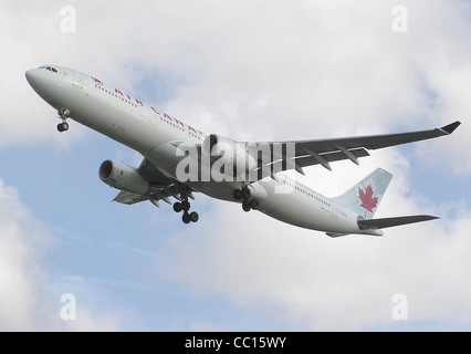 Air Canada Airbus A330-300 (C-GHKW) lands at London Heathrow Airport, England. Stock Photo