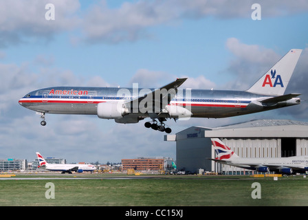 American Airlines Boeing 777-200ER landing at London Heathrow Airport Stock Photo