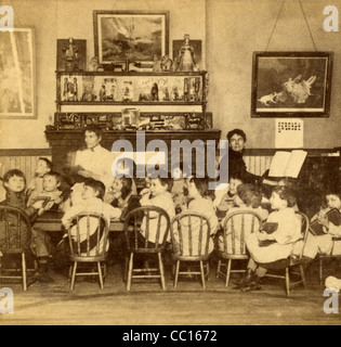 Circa 1890s stereoview card of a Kindergarten Class. Stock Photo