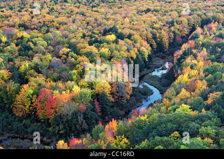 The Carp River and the autumn canopy of Ottawa National Forest and Porcupine Mountains State Park in Michigan's Upper Peninsula. Stock Photo