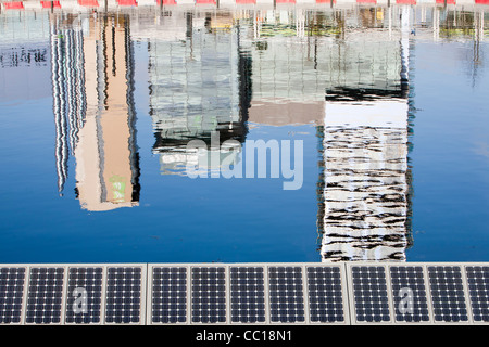 Media City at Salford Quays, Manchester, UK, the home of the BBC in the north, reflected in the Manchester ship canal. Stock Photo