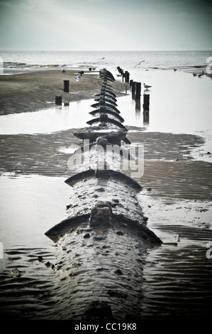 Sewage outlet pipe on the coast at Blackpool,Lancashire,UK Stock Photo