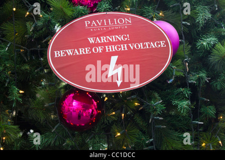 detail of Christmas tree with warning Beware of High Voltage, Pavilion mall, Kuala Lumpur, Malaysia Stock Photo