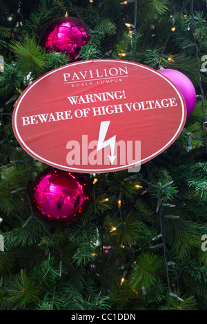 detail of Christmas tree with warning Beware of High Voltage, Pavilion mall, Kuala Lumpur, Malaysia Stock Photo