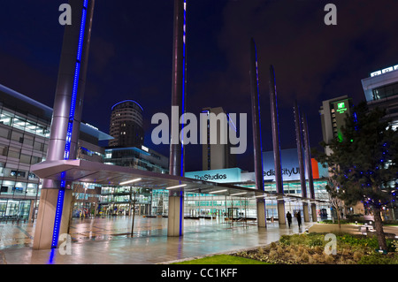The BBC studios on the piazza in MediaCityUK at night, Salford Quays, Manchester, UK Stock Photo