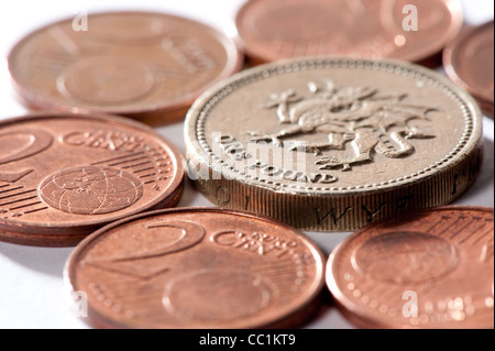 British pound surrounded by euro symbolising brexit Stock Photo