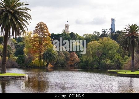 Melbourne botanic gardens ornamental lake with the government house tower in the background  view from the terrace reception Stock Photo