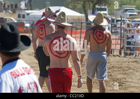 Participants in a 'Running with the Bulls' event at Cave Creek, Arizona, near Phoenix, Arizona, USA Stock Photo