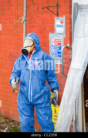 Workers removing asbestos from houses prior to demolition in Sunderland, North East, UK. Stock Photo