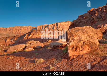 Boulders in front of Paria Plateau escarpment at Vermilion Cliffs National Monument, Arizona, USA Stock Photo