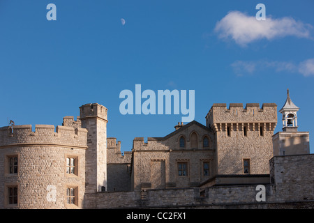 Moon in blue sky over a castle Stock Photo