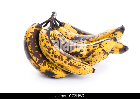 over ripe, overripe, over-ripe bunch of bananas isolated on a white background Stock Photo