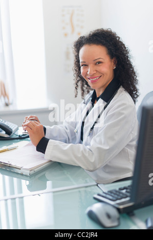 USA, New Jersey, Jersey City, Portrait of female doctor in office Stock Photo