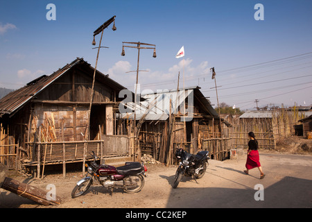 India, Arunachal Pradesh, Ziro Valley, Hari village, babo apatani cerermonial totem poles above houses Stock Photo