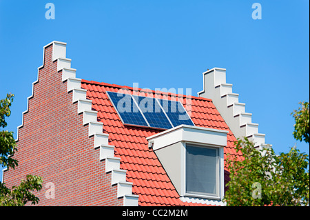 Modern Dutch house with solar panels on roof Stock Photo