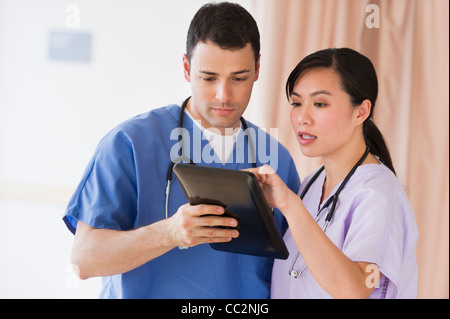 USA, New Jersey, Jersey City, Portrait of doctor and nurse using digital tablet Stock Photo