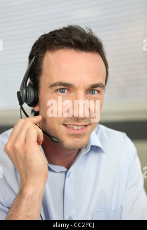 Man using a telephone headset Stock Photo