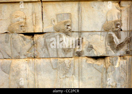 A carved relief on the walls of the ancient city of Persepolis built by Persian emperor Darius I in the 5th century BC. Stock Photo