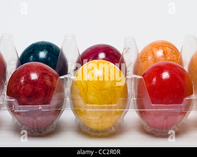colored hen's eggs in a plastic packing Stock Photo