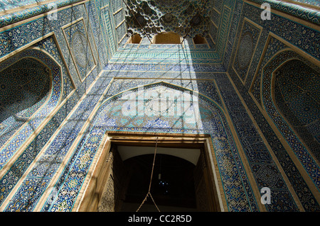 The stunning tiled entrance portal to the magnificent Jameh (Friday) Mosque in the ancient city of Yazd, Iran. Stock Photo