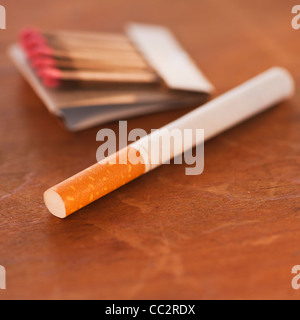 Close up of cigarette and matches Stock Photo