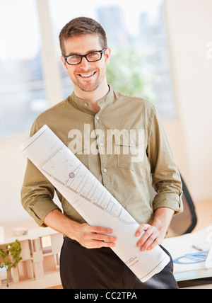 USA, New Jersey, Jersey City, Portrait of architect working in office Stock Photo