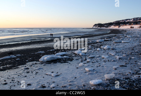Bishop's beach in Homer Alaska on a cold winter evening at dusk with ice and snow. Stock Photo