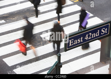 USA, New York City, Manhattan, 42nd street, Pedestrians on zebra crossing Stock Photo