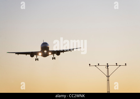 USA, New York City, Commercial aeroplane taking off from runway Stock Photo