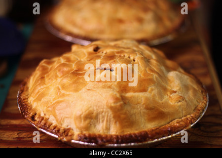 Two apple pies, foreground focused, background blurred Stock Photo