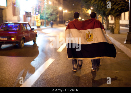 Youth adorn themselves with an Egyptian flag in Cairo, Egypt. Stock Photo