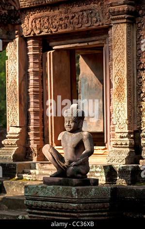 Statue of Yaksha as a temple guardian, Mandapa of central sanctuary, Banteay Srei temple, Citadel of the Women, Angkor, Cambodia Stock Photo