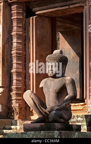 Statue of Yaksha as a temple guardian, Mandapa of central sanctuary, Banteay Srei temple, Citadel of the Women, Angkor, Cambodia Stock Photo